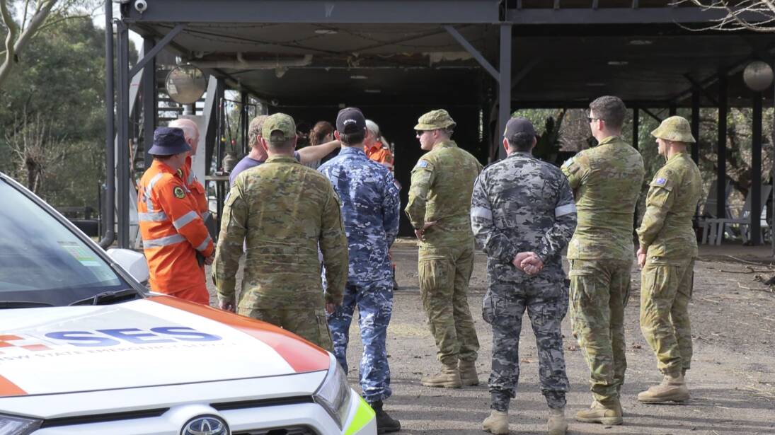 Personnel from the Australian Defence Force joined NSW Rural Fire Service, NSW State Emergency Service, and Fire and Rescue NSW personnel in a multi-agency effort to support flood-impacted residents in Windsor in July. Picture: NSW SES