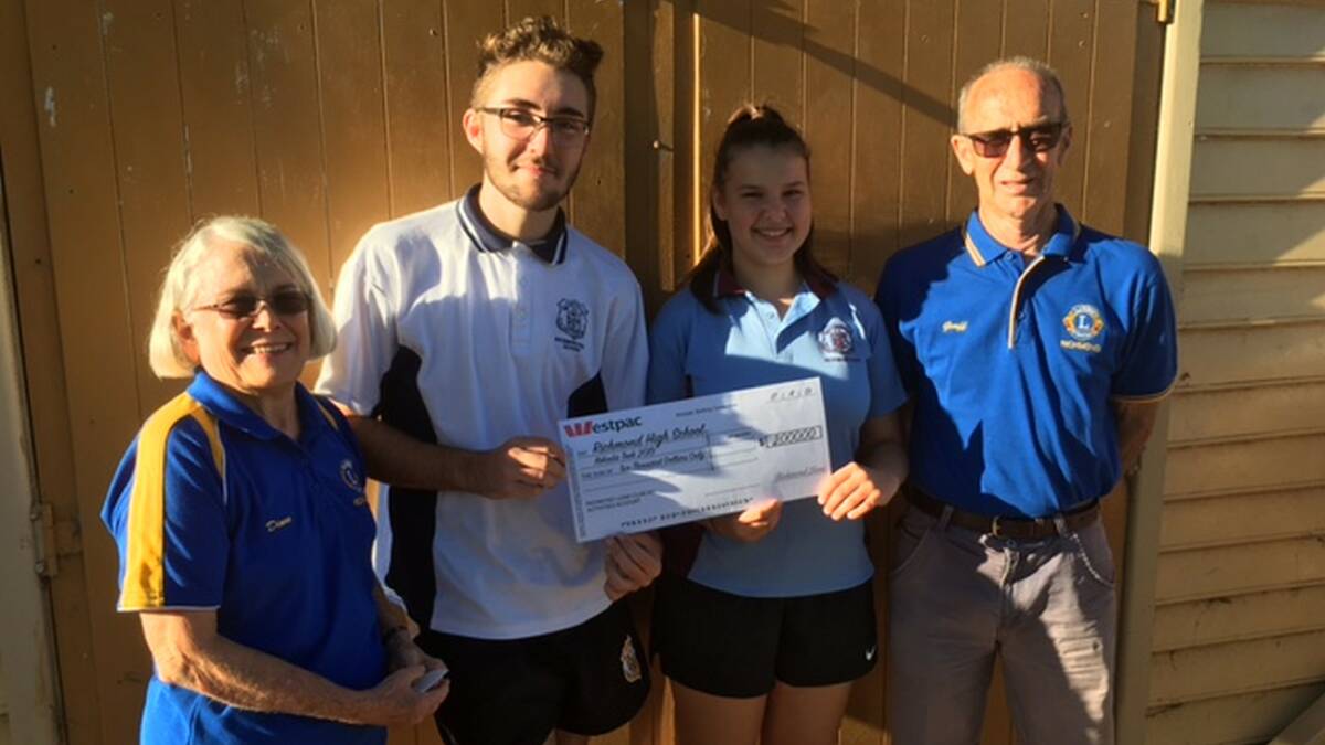 (L) Richmond Lions president Diane Sherrington and (R) president elect Geoff Ingram present the $2,000 cheque to Richmond High students Cameron Mew and Teagan De La Hunty. Picture: Supplied