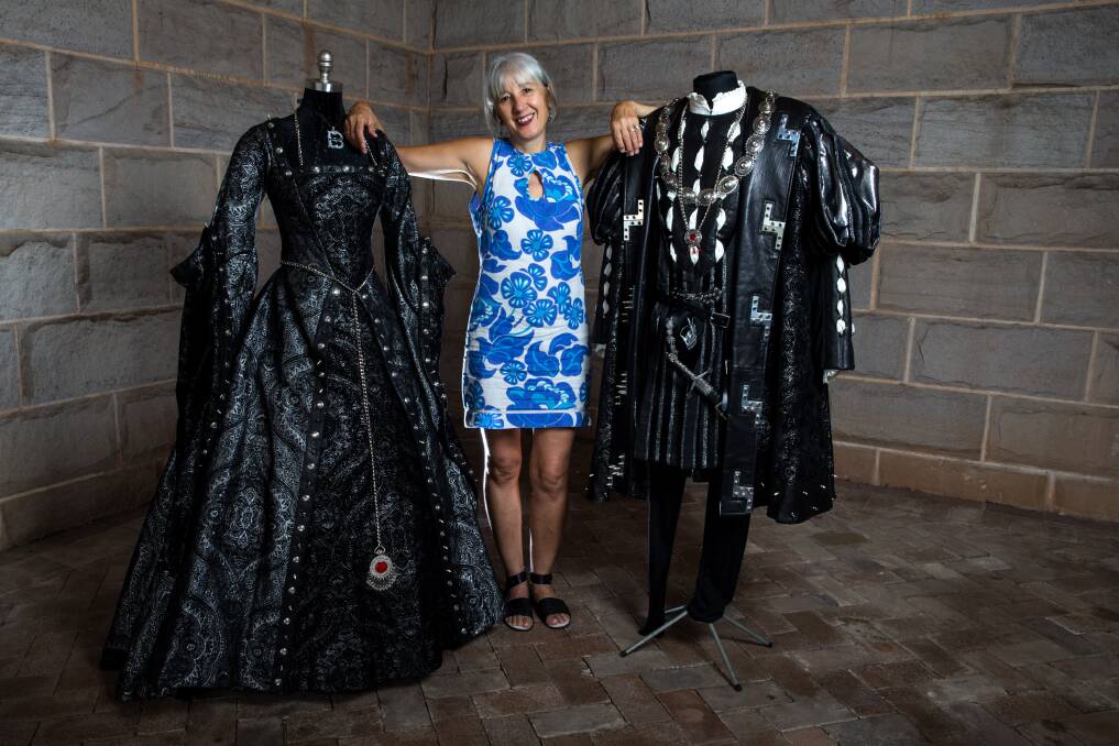 Her proudest work: Hawkesbury-based costume maker Lynette McKinley with her punk Henry VIII and Anne Boleyn creations at her Wisemans Ferry home. Picture: Geoff Jones