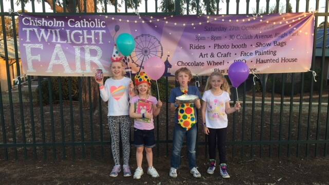 Pupils Alexander Chapman, Tahlia Chapman (pink shirt), Elizabeth Deters (purple sneakers) and Helen Deters (pony tales) get set for the Twilight Fair. Pictures: Supplied