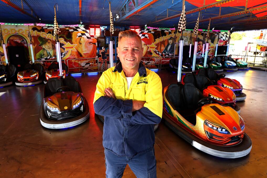 Drifting dodgems: Elwin Bell from Bells Amusements with the new drifting dodgem cars that are sure to attract some thrill-seekers this Hawkesbury Show. Picture: Geoff Jones.