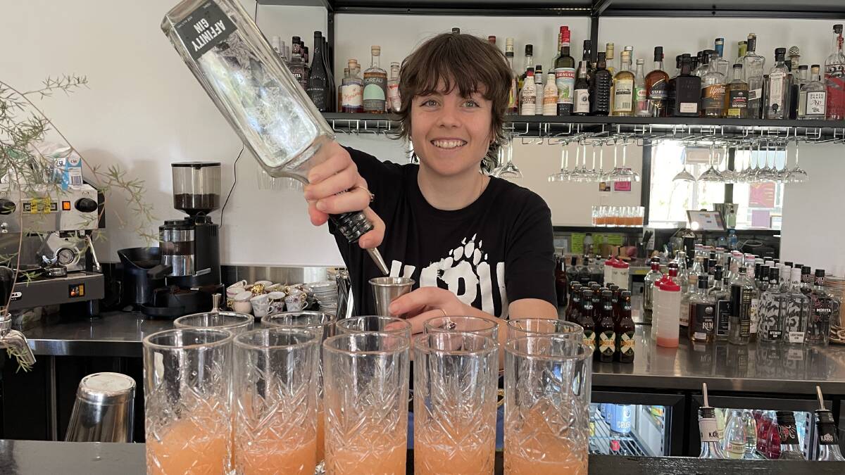 House of Spirits bar manager Irene Easton gets busy behind the bar. Picture: Sarah Falson