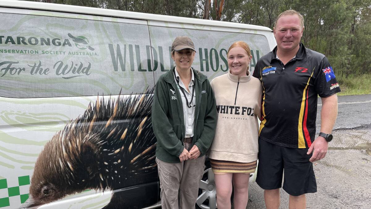 Liz Arthur, supervisor for Taronga's Wildlife Hospital, with Mikayla Pullan who named Gerald, and Gerald's rescuer James Pullan at Cattai. Picture: Sarah Falson