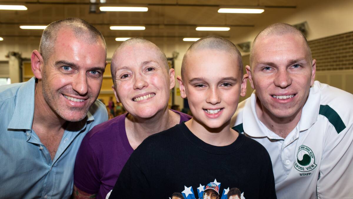Principal Damien Feneley, Deb Murray, ten year old Bert, and teacher Matt Chenery all had their heads shaved for blood cancer. Pictures: Geoff Jones