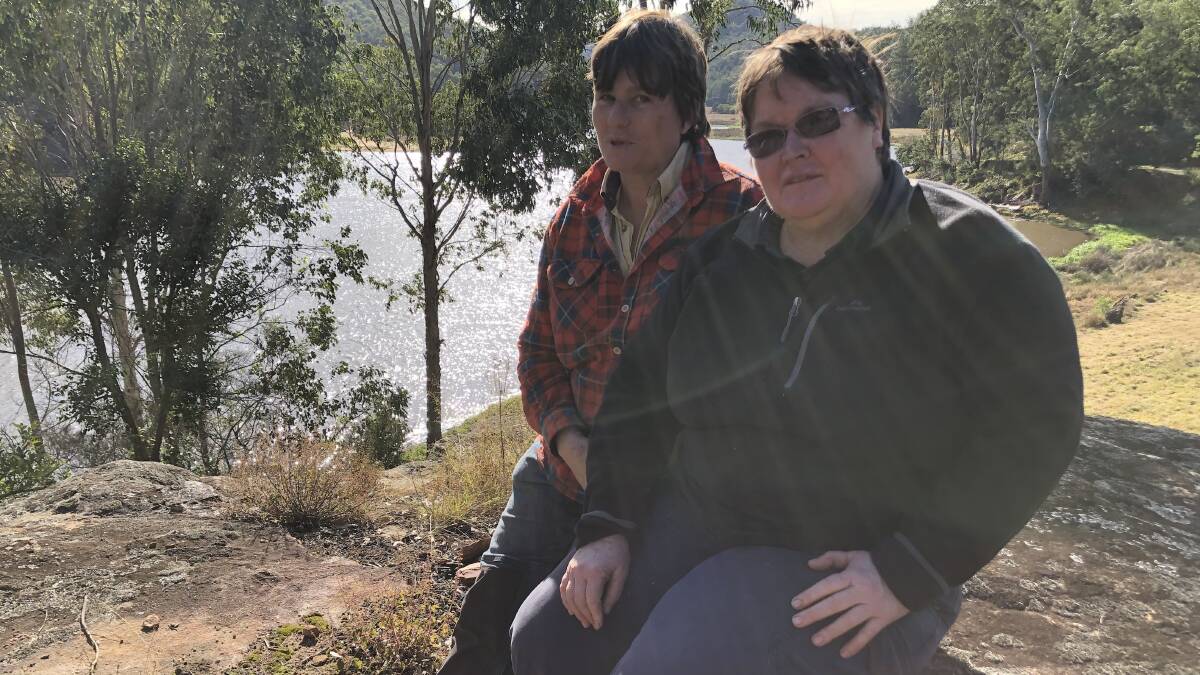 Help for farmers: St Albans farmer Sherri (dark coloured jumper) is rallying for mental health support in her community. She is pictured here with her partner Ingrid. Picture: Supplied