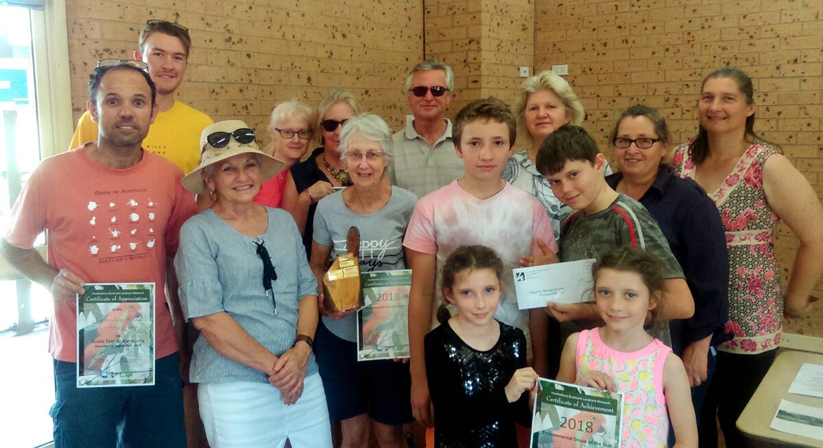 GREEN THUMBS: L-R: Martin Gauci, Richie Benson, Wendy Lawson, Rosemary Otten, Janet Fox, Patricia O’Toole, John Parmenter, Charlie Medo, Charlotte, Cathryn and Jack Miller, Councillor Kotlash, Melissa Medo and Gillean Miller. Picture: Supplied
