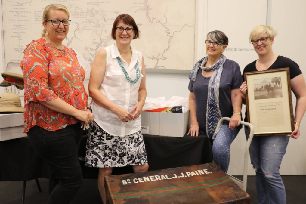 Museum curator Rebecca Turnbull, Susan Templeman MP, Christine Paine and Jessica Paine with some of the items to be restored. Picture: Supplied