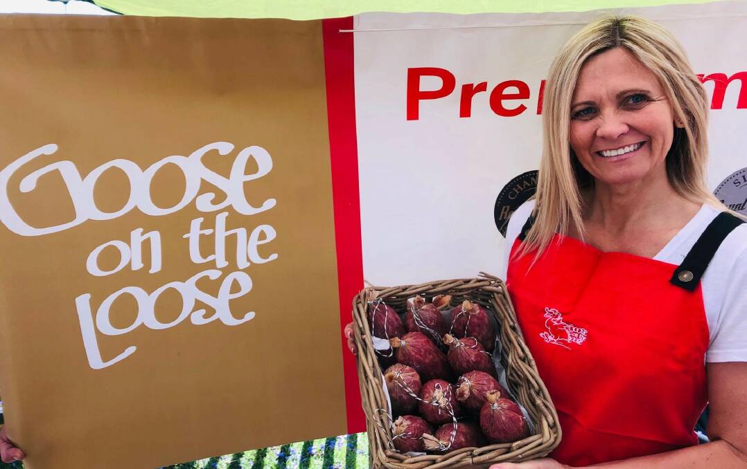 Annette from Goose on the Loose, selling locally-made salami at the Richmond Good Food Market. Picture: Supplied