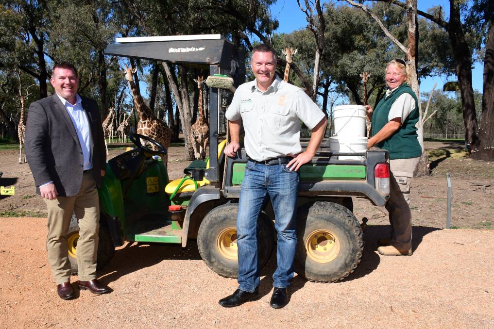Welcome: Dubbo MP Dugald Saunders, Taronga Western Plains Zoo director Steve Hinks and keeper Pascale Benoit in the lead-up to the June 1 reopening. Photo: BELINDA SOOLE