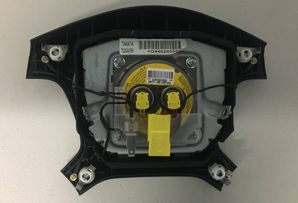 The flipside of a typical steering wheel boss, showing a faulty Takata airbag explosive charge. Picture: Supplied 