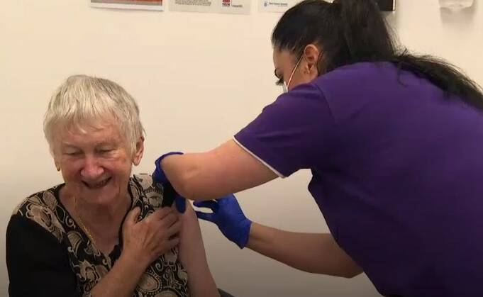 Jane Malysiak receives the first COVID-19 vaccine administered in Australia. Picture: ABC News
