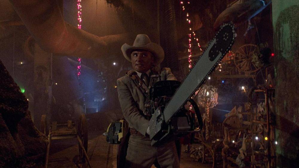 Dennis Hopper with his rather large saw in Texas Chainsaw Massacre II.