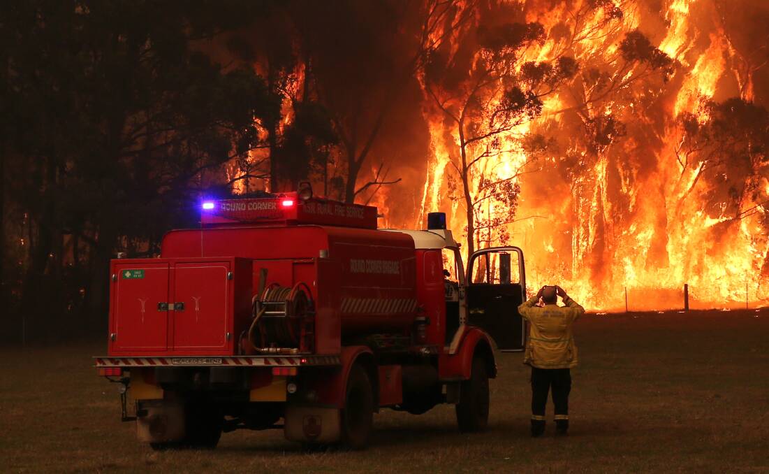 Danger zone: RFS crews could only look on as fire burned out of control on a property at Inberra Road, Bilpin on Thursday. Picture: Geoff Jones