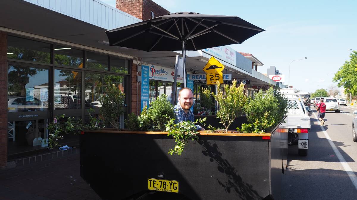 Mayor Patrick Conolly at the "parklet" which was trialed recently at South Windsor shops. Picture: Supplied