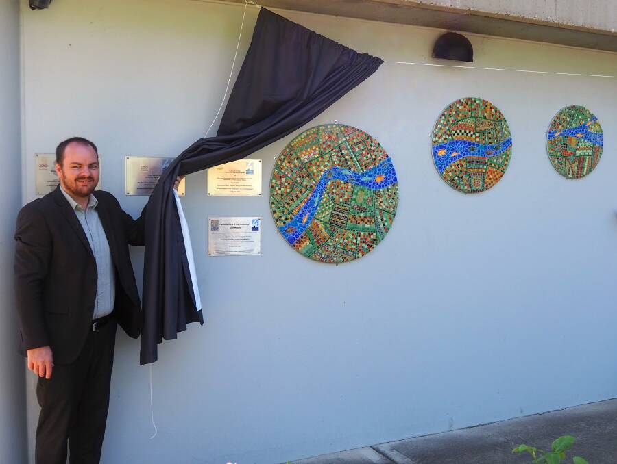 Hawekesbury Mayor Patrick Conolly unveils the mew mosaic. Picture: Supplied