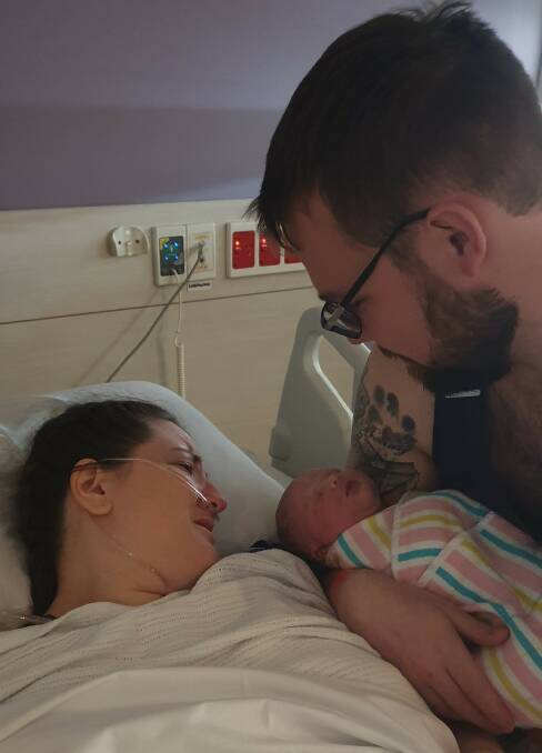 Welcome to the world: Rowena and Mark Thring with baby Hazel.