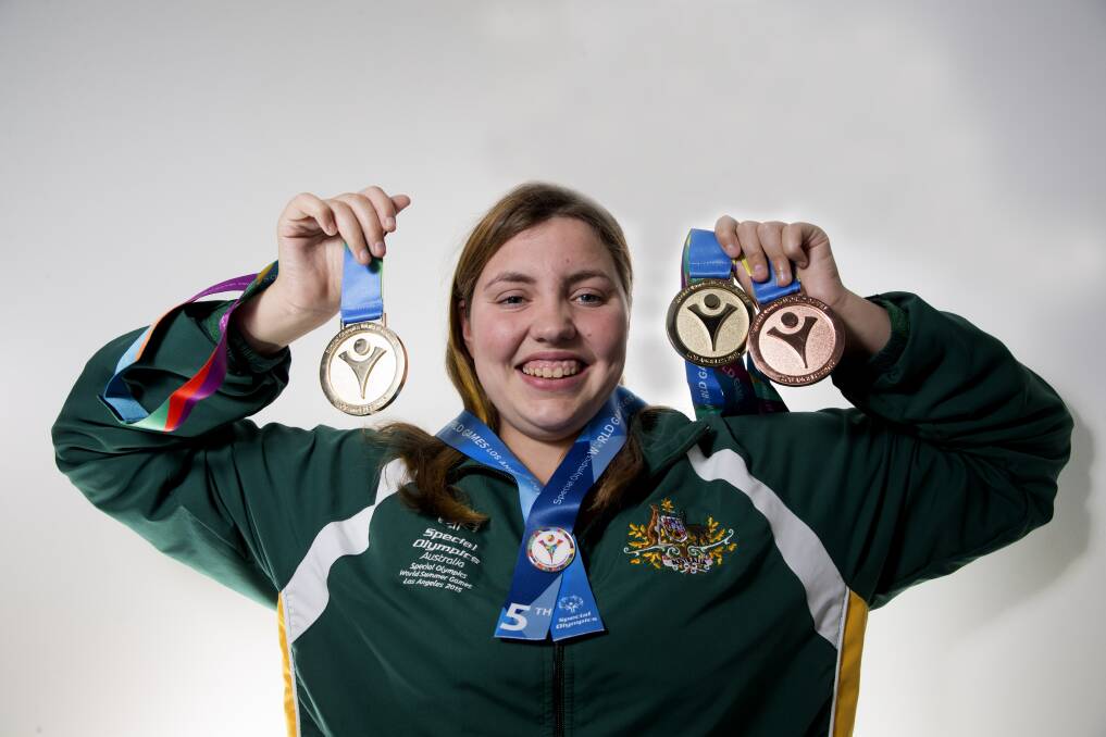 Sandy Freeman and the medals she won at the Special Olympics World Games in 2015. Picture: Geoff Jones