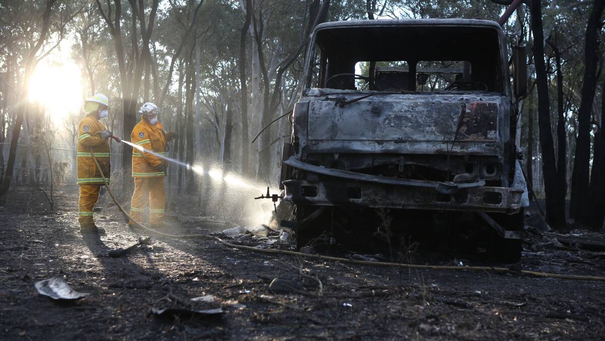 NSW RFS crew members after a fire in Londonderry, 2016. Picture: James Alcock/Fairfax Media