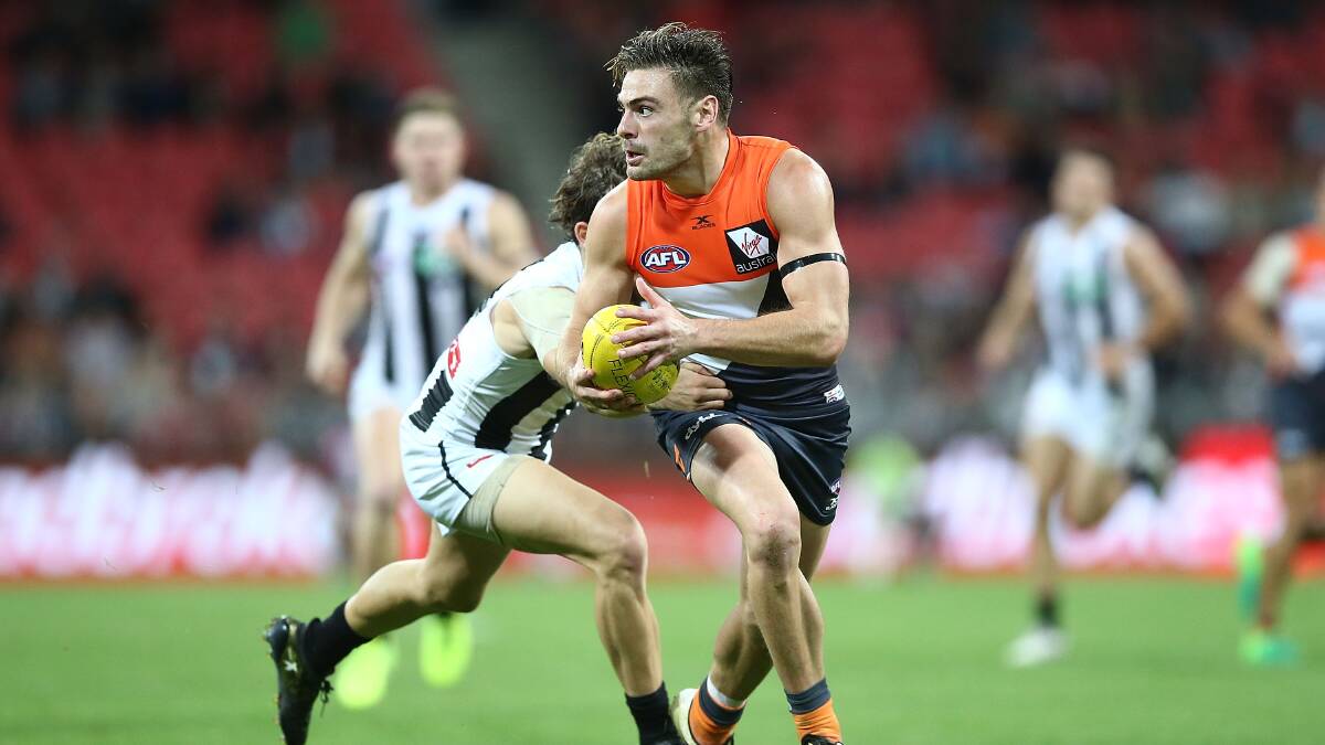 INJURED: GWS Giants player Stephen Coniglio injured his ankle in the fourth quarter of the match against Collingwood and has had surgery to repair it. Picture: Getty Images