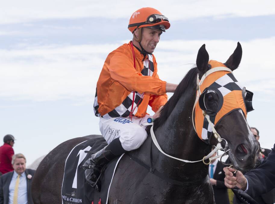 Tye Angland rode Ace High to victory in the Spring Champion Stakes on Saturday. Picture: AAP Images