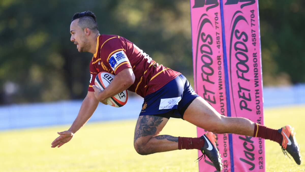 Hawkesbury Ag College player Dean Jones crosses the stripe to score a try while playing in the first grade side's victory over Hawkesbury Valley. Pictures: Geoff Jones