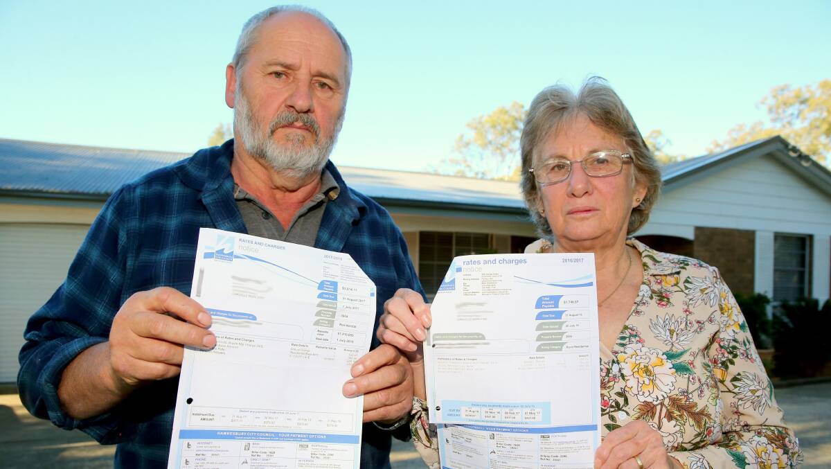 Oakville residents Fritz and Maree Hofer risk losing part of their property to the newly announced M9 corridor, and next year will pay more than $4000 in rates and charges. Picture: Geoff Jones
