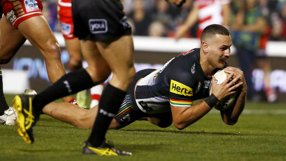 Reagan Campbell-Gillard scores in the closing minutes of the Penrith Panthers' top of the table clash against the St George-Illawarra Dragons at the weekend. Picture: AAP Image/Daniel Munoz