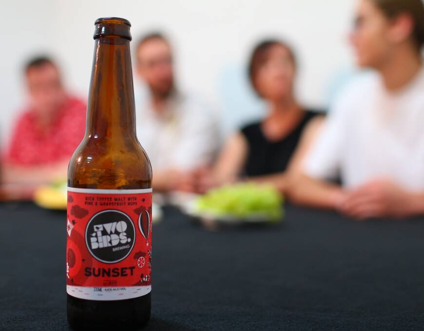 Mixed opinions: Our panelists didn't really know how to feel about Two Birds Sunset Ale. Picture: Geoff Jones 