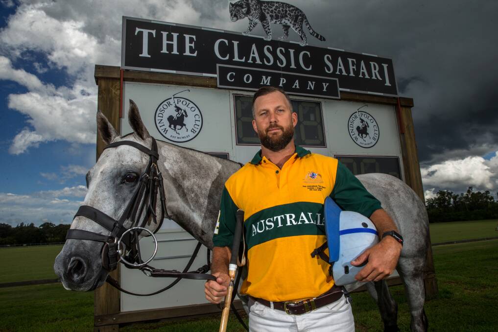 Australian Polo player Dirk Gould with his stallion Smurf at Windsor Polo Fields. Picture: Geoff Jones.