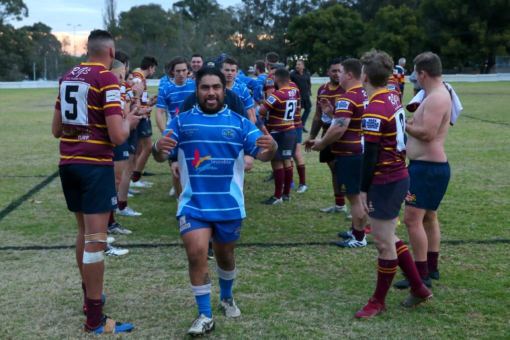 Back to Valley: Hawkesury Valley are tunnelled off by HAC rugby after winning first grade. Picture: Geoff Jones
