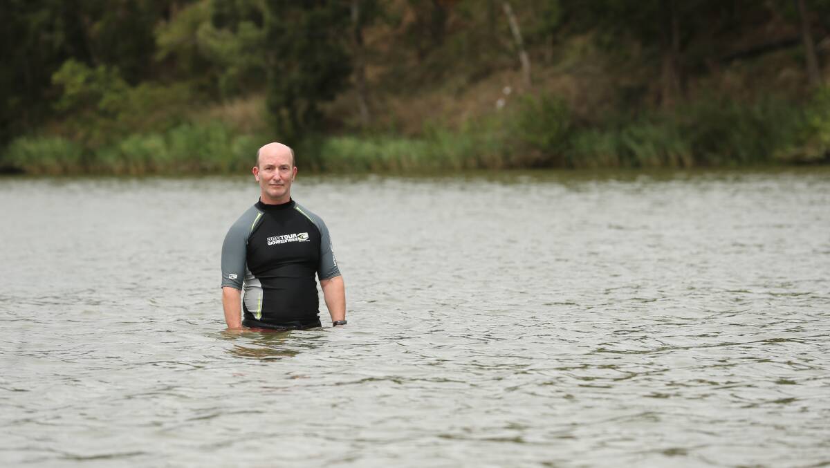 Dr Ian Wright, water quality expert and senior lecturer at Western Sydney University, at the Hawkesbury River, Windsor. He is calling for water authorities to make public their water quality tests so residents can make an informed choice about swimming. Picture: Geoff Jones