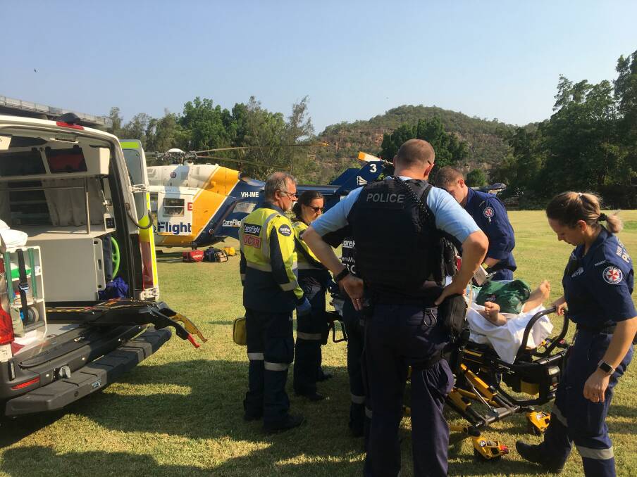 Burns: The man is treated at the scene. Picture: CareFlight.