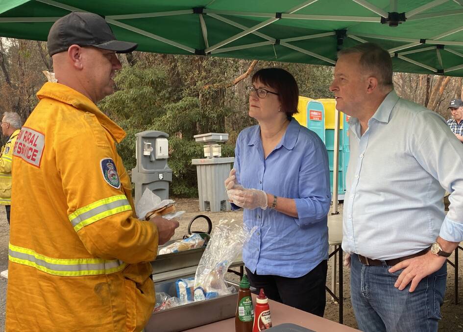 Macquarie MP Susan Templeman and Opposition Leader Anthony Albanese speak with Rural Fire Service volunteers in Bilpin this morning. Picture: Supplied.