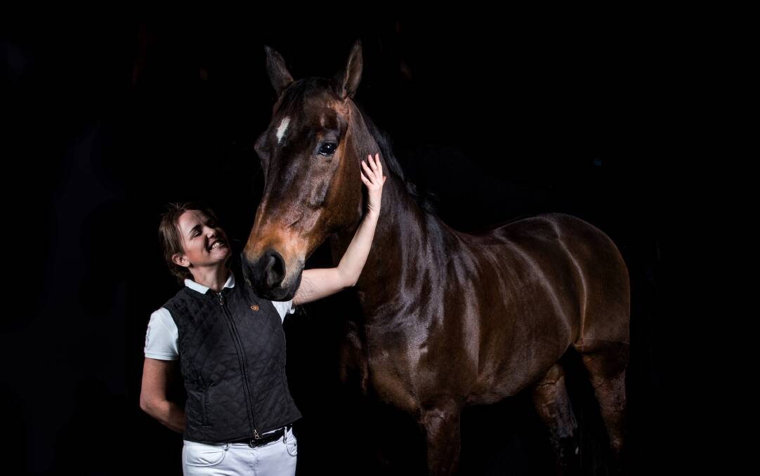 Hawkesbury horse: Supreme Ambition - aka Fatty - and Gazette journalist Krystyna Pollard pose for photographer Geoff Jones.