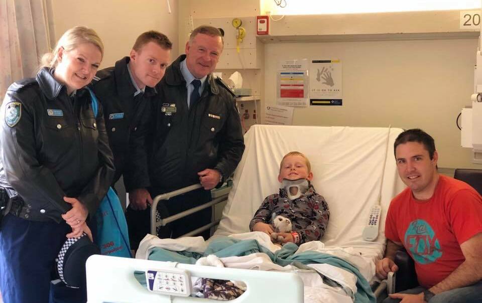Hawkesbury officers with a young patient from The Children's Hospital, Westmead. Picture: Hawkesbury Police Area Command/Facebook.