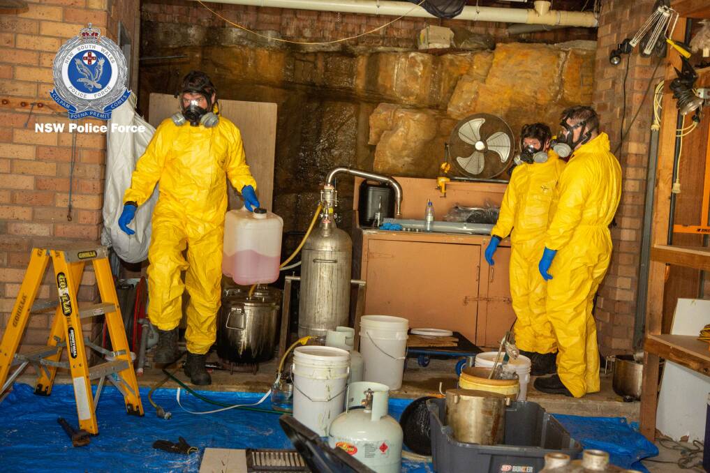 Drug lab: Officers from Strike Force Badajoz dismantle one of the drug labs. Picture: NSW Police.