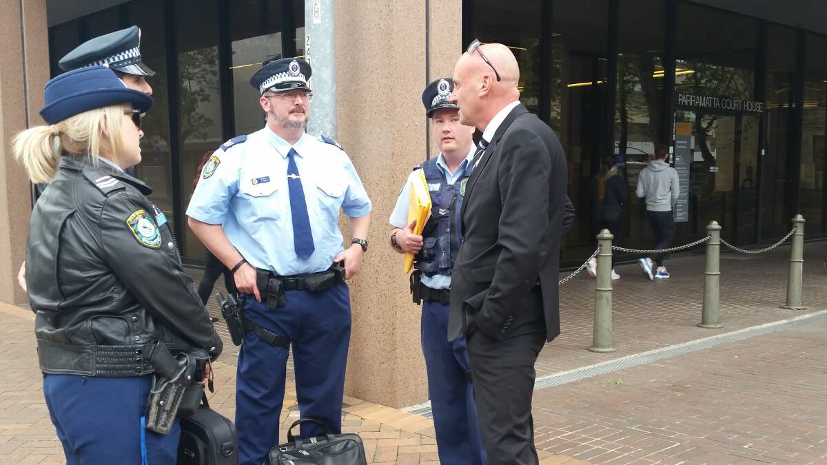 Some of the Hawkesbury police officers involved in the case outside Parramatta Local Court on Tuesday.