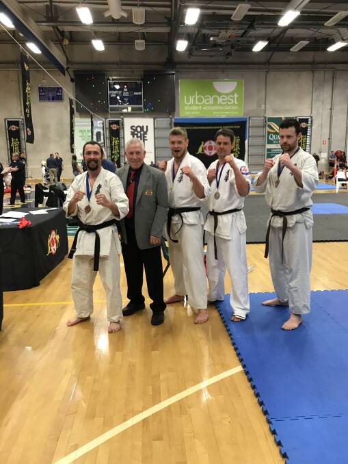 Success: Tim Smith, third from left, following his victory at the 2018 Australian Non-Contact Karate Tournament held at Sydney University Sports and Aquatic Centre last month. Picture: Supplied.