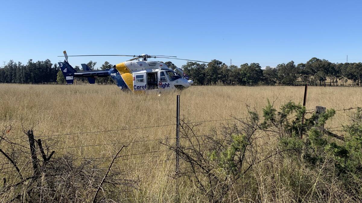 The CareFlight helicopter landed in a nearby paddock.