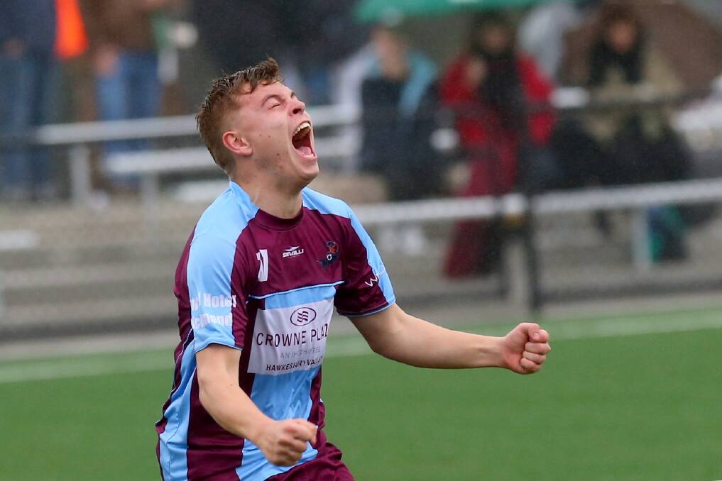 Score: Callum Elliot celebrates after scoring a goal that contributed to Hawkesbury City FC's under-20s' win against Dunbar Rovers in their semi-final. Picture: Geoff Jones.