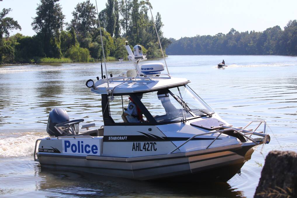 Search: NSW Police, NSW Police Divers, RMS and SES search for a man's body after a jet ski accident on February 17 on the Hawkesbury River at Wilberforce. Picture: Geoff Jones.