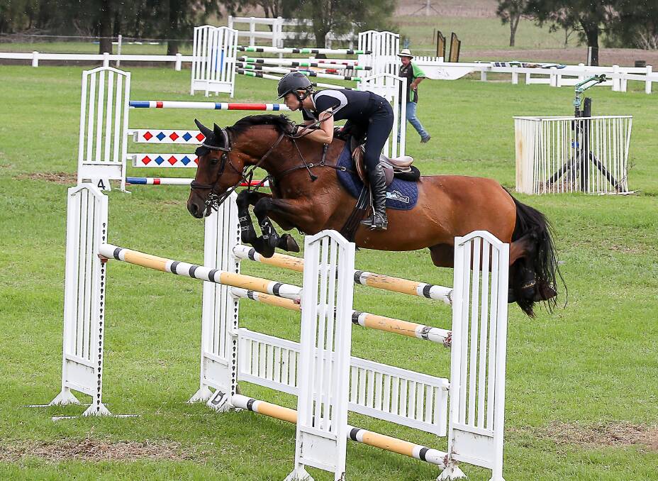 Riding high: Agnes Banks rider Monique Barrett in the 1.40m event at the Sydney Jump Club training day. Picture: Jenny Sheppard.