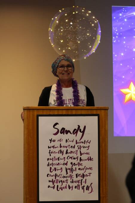 Inspirational: Sandy Eglin speaks to those present at North Richmond Panthers on the night. The event raised more than $40,000.