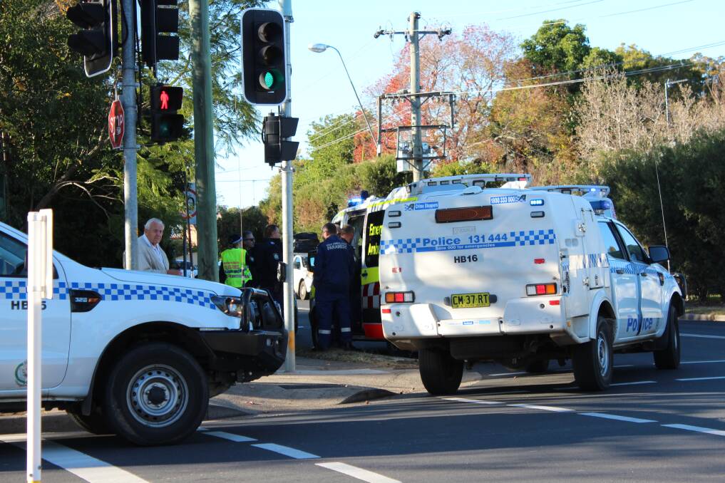 Scene: Police and NSW Ambulance crews at the scene of the incident on Thursday.