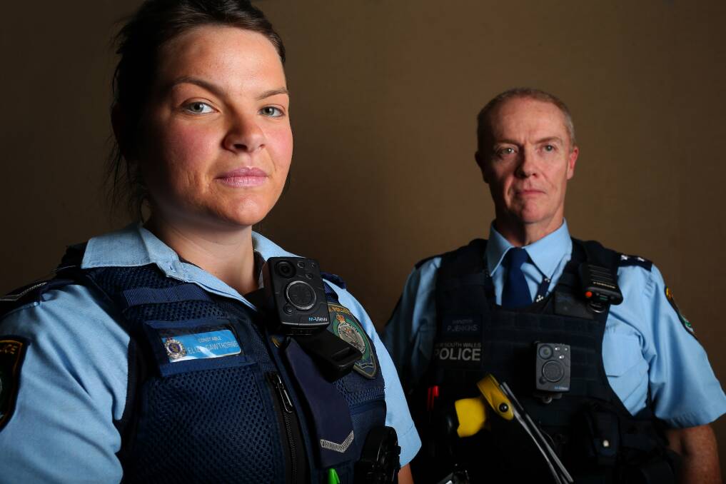 BWV: Windsor police officers Constable Eliza Gawthorne and Inspector Peter Jenkins wearing the new NSW Police body worn video (BWV). Picture: Geoff Jones