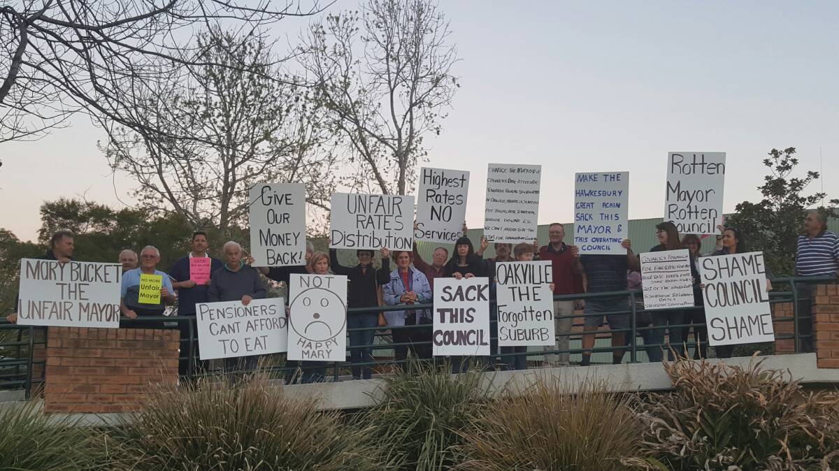 Protesting rates: Residents outside Hawkesbury council chambers prior to the mayoral vote on September 19 to protest rates increases of up to 380 per cent. Picture: Oakville Progress Association.