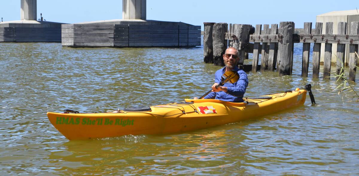 She'll be right: Luke Cable kayaks into Goolwa following the completion of a 50-day journey down the length of the River Murray. 