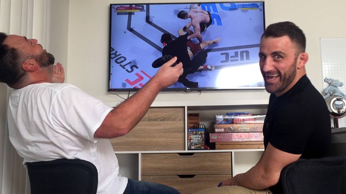 OH THE PAIN OF DEFEAT: Like in real life, UFC Featherweight world champion Alex Volkanovski proved to good for Mercury reporter Agron Latifi in their virtual UFC fight. Picture: Robert Peet