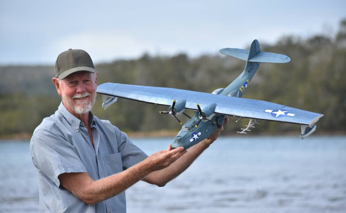 Plane passion: Lakewood's Bob Craine and his model Catalina, similar to the one Bob Hope landed in on the Camden Haven River in August 1944. Photo: Kate Dwyer. 
