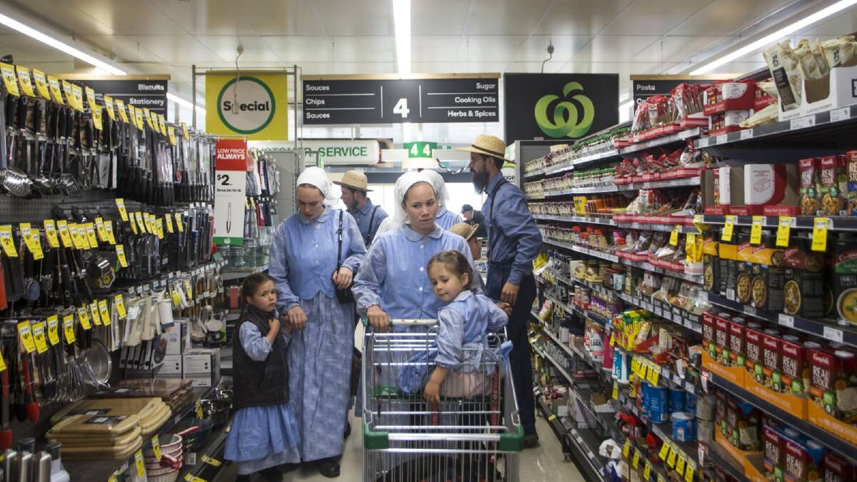 The McCallums go shopping in Woolworths. Elizabeth pushes Abi in the trolley. Picture: MEREDITH O'SHEA